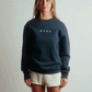 POLERON CREWNECK REGULAR MUJER TAPU AZUL MARINO WAKA
