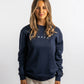 POLERON CREWNECK REGULAR MUJER TAPU AZUL MARINO WAKA